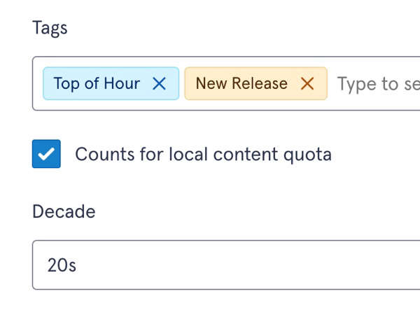 Screenshot of item editor, showing a tag field with 'top of hour' and 'new release', a checkbox, and a decade field