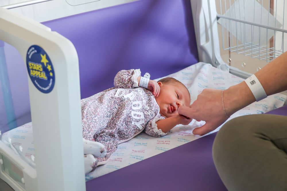 Baby Matilda in a cot. Picture by Spencer Mulholland 