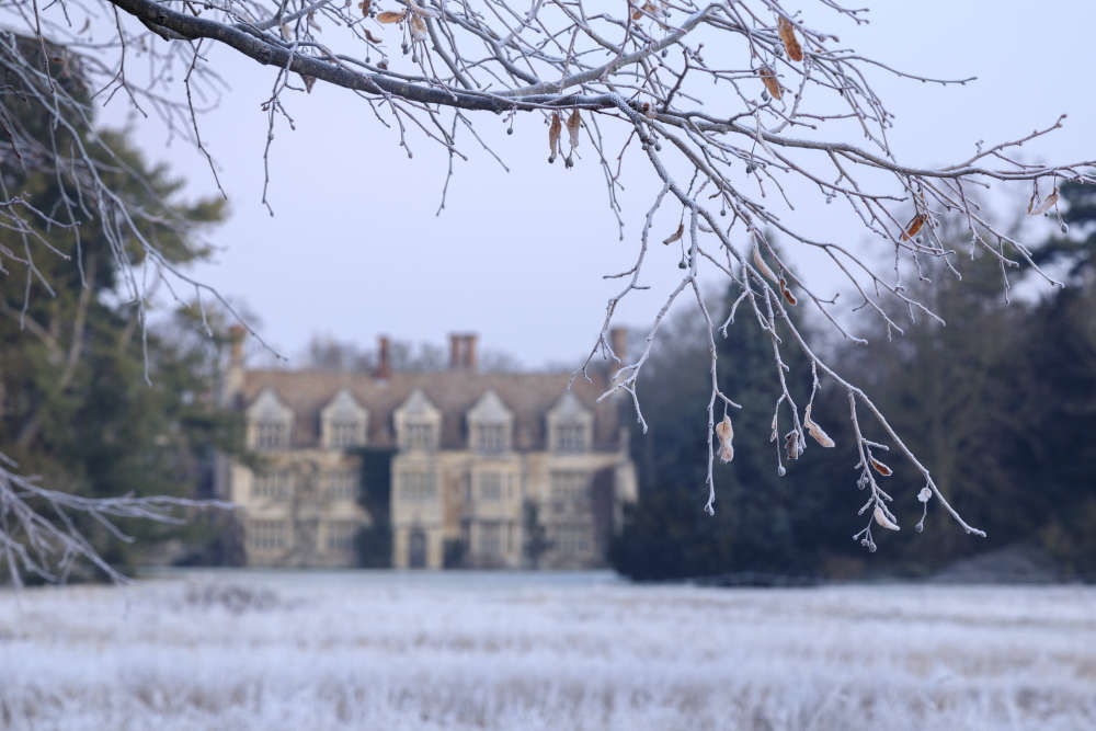 Frosty view of the house at Anglesey Abbey © National Trust Images Justin Minns