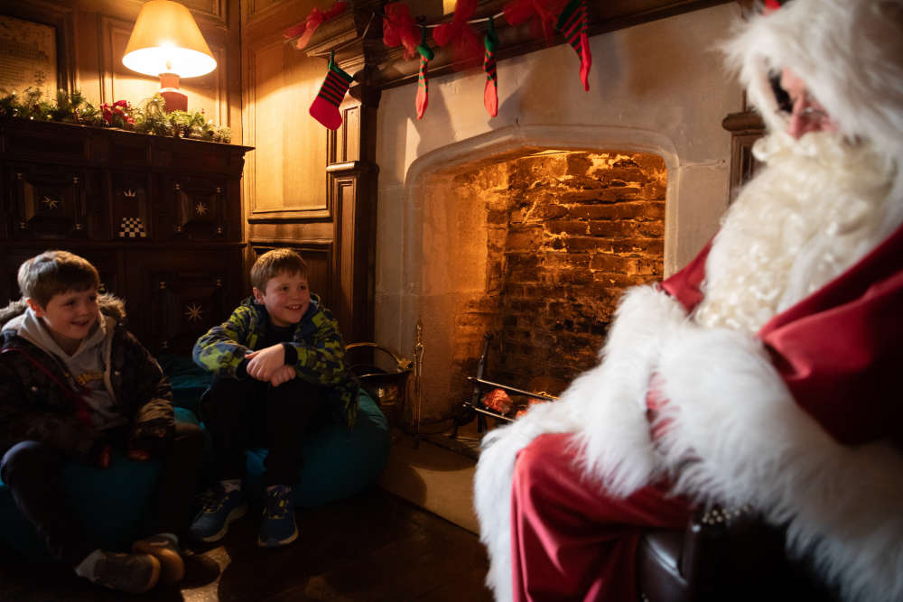 Children meeting Father Christmas ©National Trust Images Rebecca Hughes