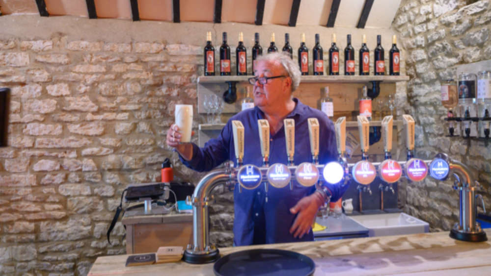 Jeremy with a beer in Clarkson's Farm