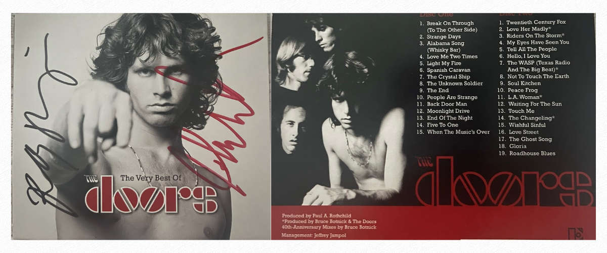 Signed The Doors CD set by John Densmore and Robby Krieger