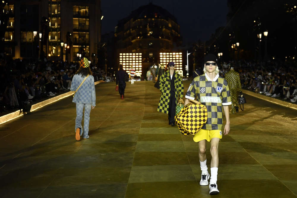 PHERRELL WILLIAMS STAGES LOUIS VUITTON DEBUT ON PONT NEUF - JUST NEWS  INTERNATIONAL