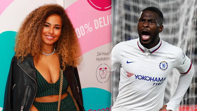 Amber Girl at a recent event alongside a photo of Chelsea footballer Fikayo Tomori celebrating a goal