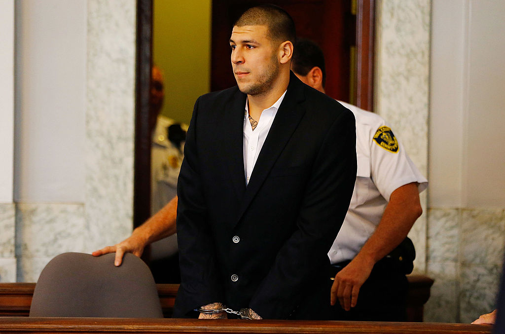 Aaron Hernandez being led into court in handcuffs during his 2013 murder trial