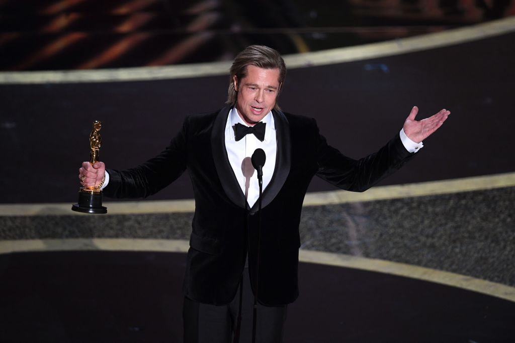 Brad Pitt accepts the award for Best Supporting Actor