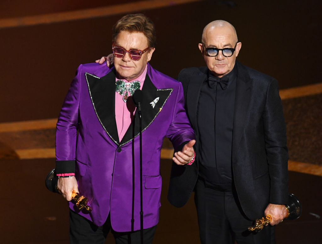 Elton John and Bernie Taupin accept the Original Song award for 'I'm Gonna Love Me Again'