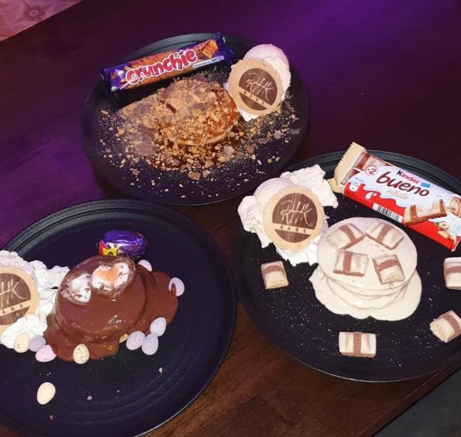 The Crunchie Pancakes, Creme Egg Pancakes and White Kinder Bueno Pancakes displayed on a table in the Paddocks