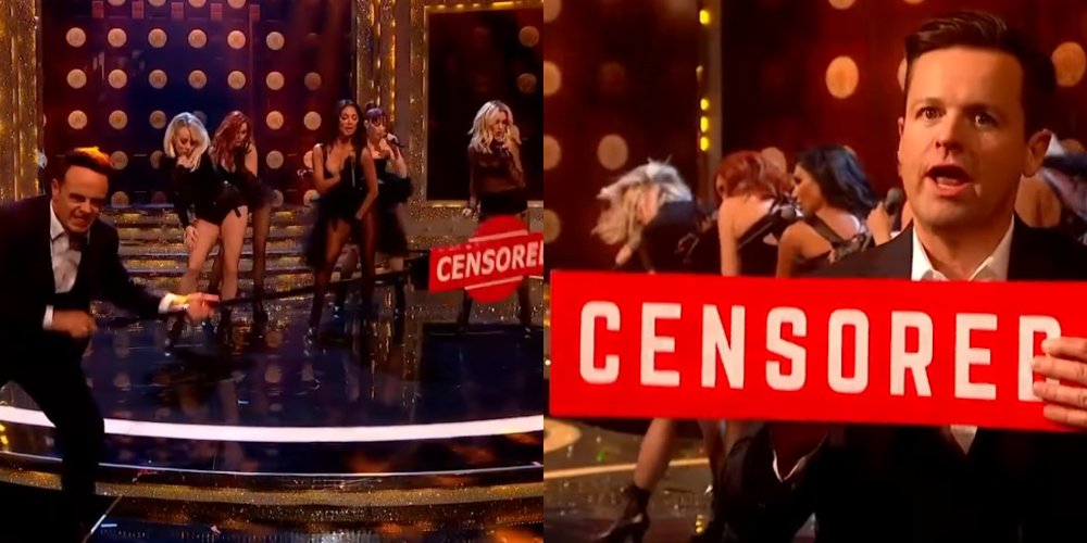 Ant & Dec jokingly holding 'censored' signs over the Pussycat Dolls while they perform