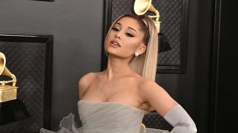 Ariana Grande glows in a cut out Versace dress as she attends her first  live The Voice show