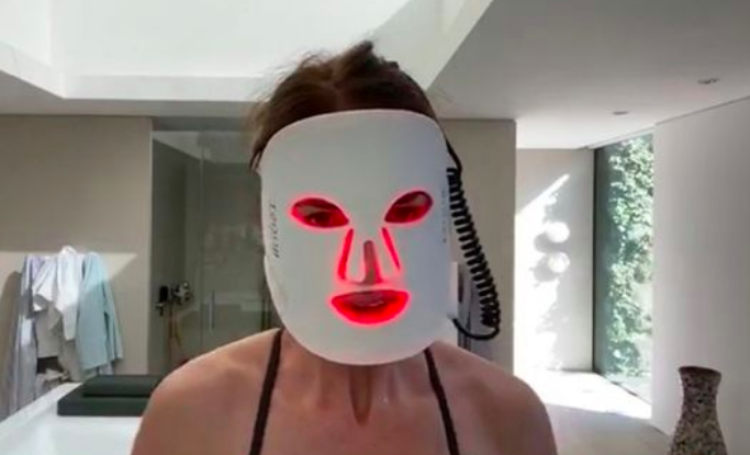 Trinny using an LED mask during her live stream