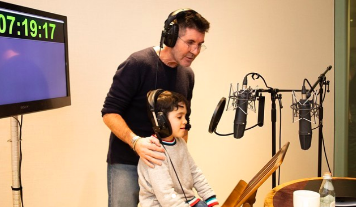 Simon Cowell and son Eric in the voice booth during production for Scoob!