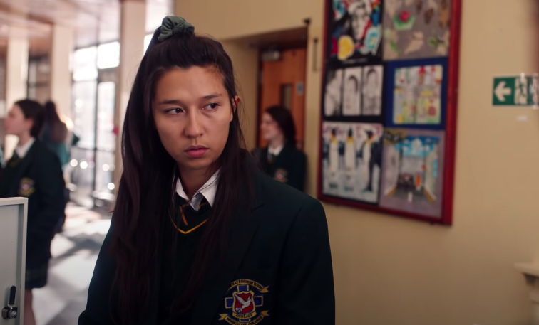 Aoife Hinds as Mae Cheung in Derry Girls