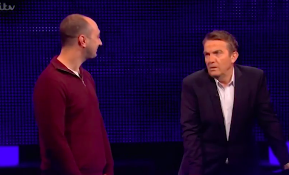 Bradley Walsh stares at contestant Scott in anger