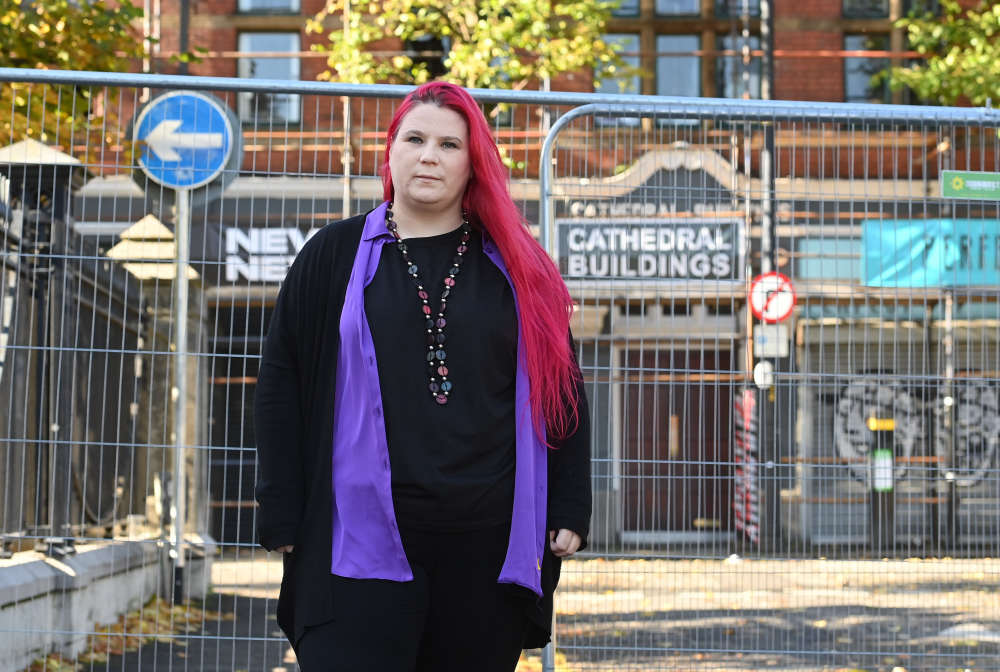 Tina Calder, owner of Excalibur Press outside Cathedral Buildings in Donegall Street.