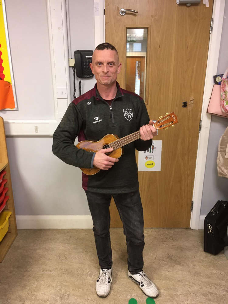 Ukulele man giving children the gift of music - Vimarsana News