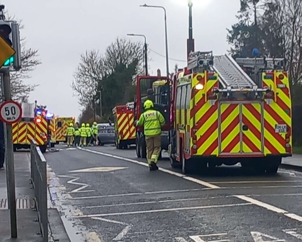 The collision, involving a truck and three other vehicles, occurred shortly before 2:30pm. 