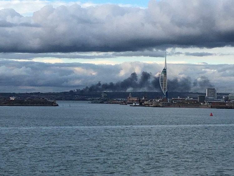 Thick black smoke seen from the Island