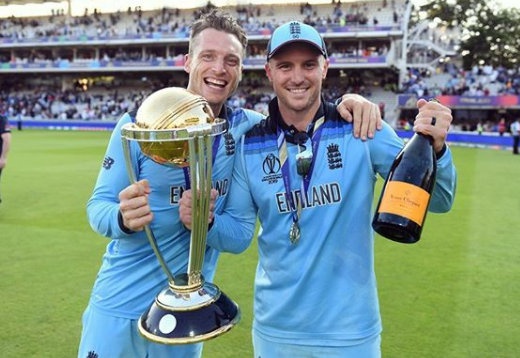 Jason Roy (right) with Jos Buttler after winning the World Cup