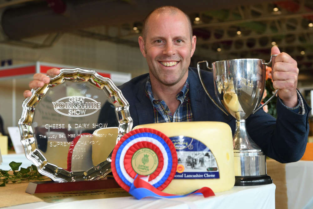 Supreme Champion Cheese Managing Director Nick Kenyon Dewlay Cheesemakers for Creamy Lancashire.