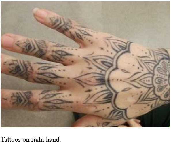 Lisa Hutchinson's hand Tattoo. Photo provided by OPP