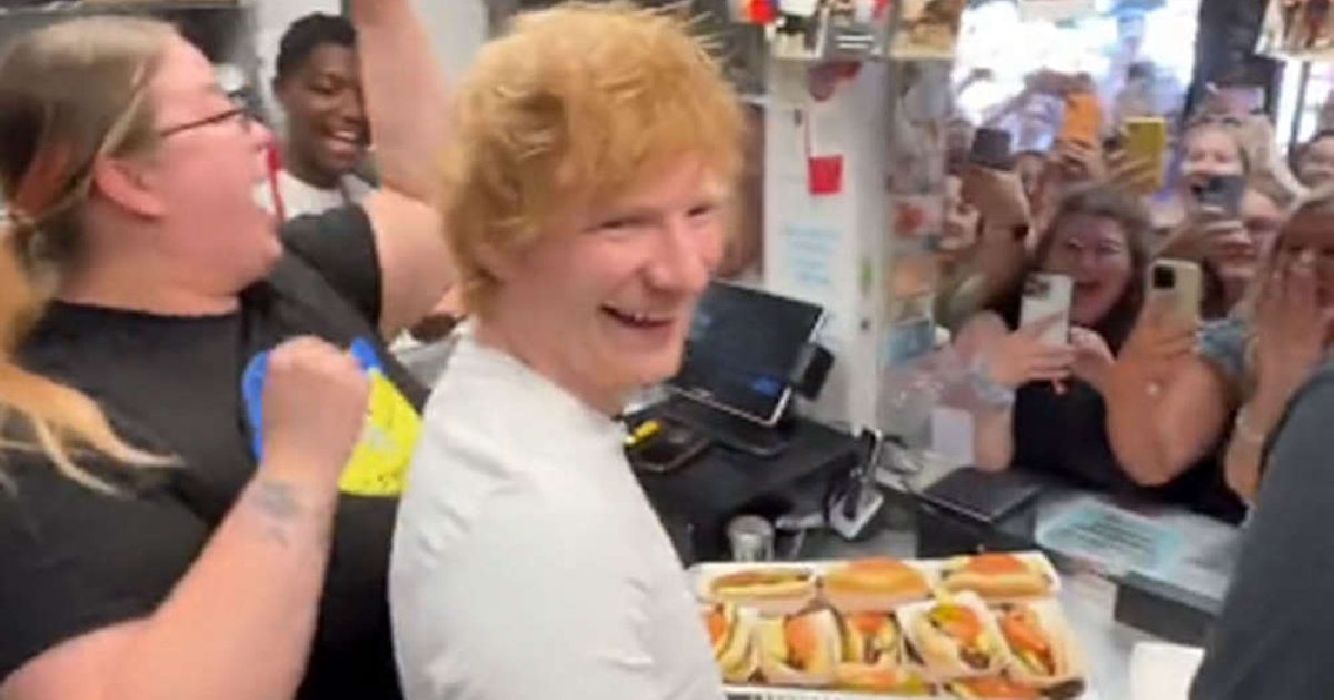 Ed Serving Up Hot Dogs - Vimarsana News