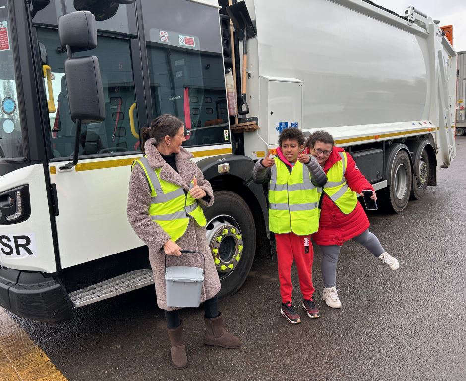 Bin lorry fan Jerome, mum Bridget and daughter Rose