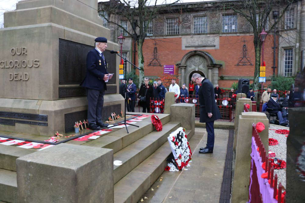 Councillor James Dawson represents the Borough Council on Armistice Day 2025